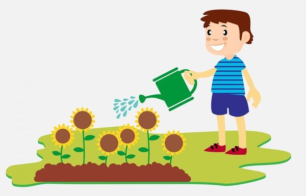 happy boy watering the flowers