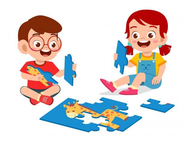 little boy and girl doing puzzle together